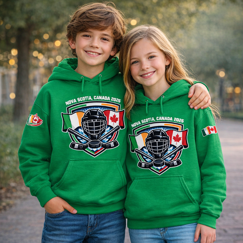 Two children wearing green hoodies with a sports design and 'Nova Scotia, Canada 2026' text.