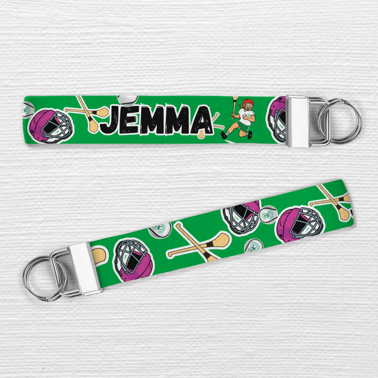Keychain with 'Jemma' on a green background with sports-themed design
