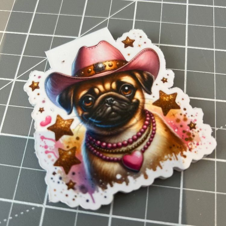 Sticker of a pug dog wearing a cowboy hat with decorative elements on a grid background