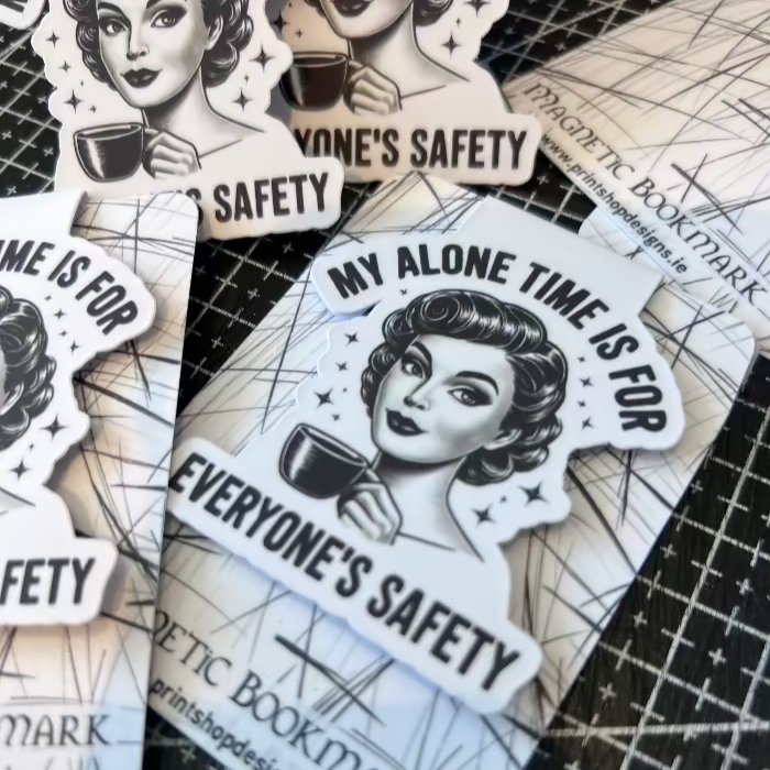 Sticker with a design of a woman holding a coffee cup and text on a textured surface.