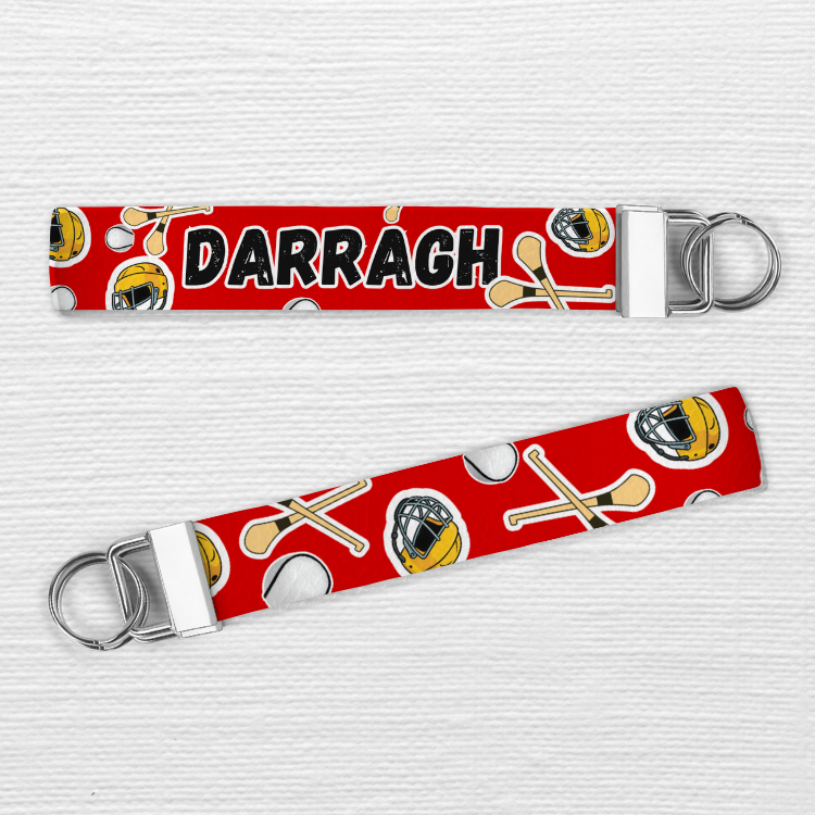 Keychain with sports-themed design and 'DARRAGH' text on a red background